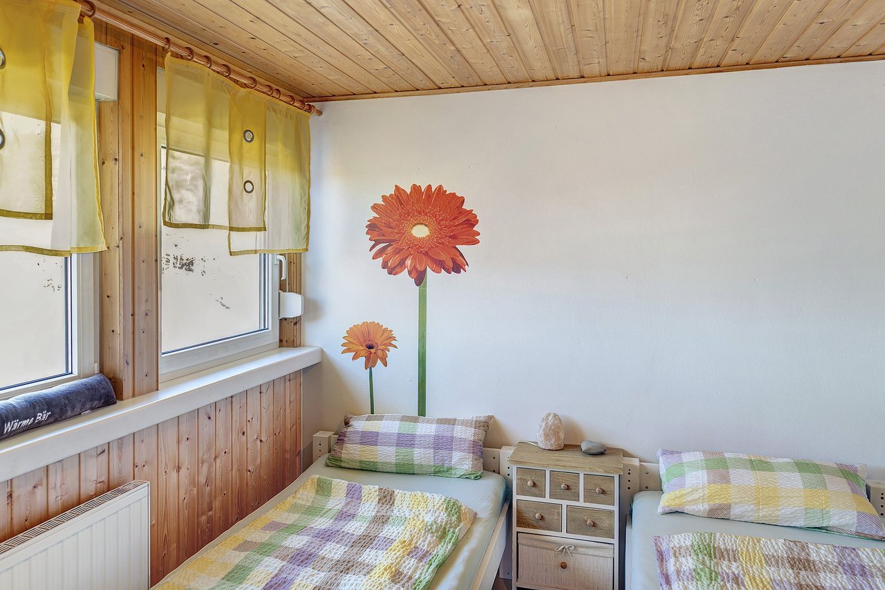 Schlafzimmer mit zwei Betten, Fewo Tanja’s Blumenparadies in Hollfeld, Bayern