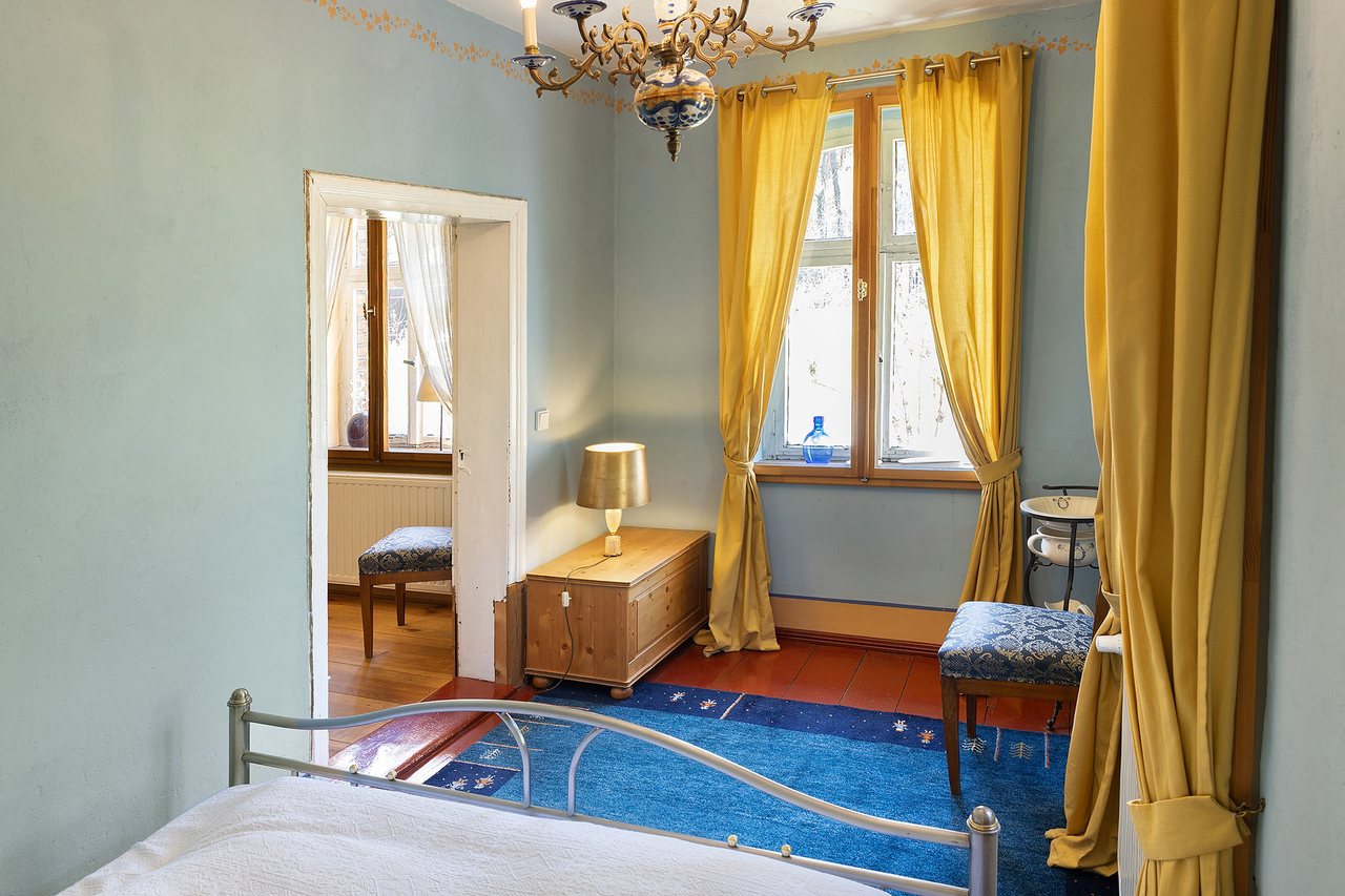 Schlafzimmer mit Doppelbett, Ferienwohnung am Roten Schloss in Baruth/Mark, Brandenburg