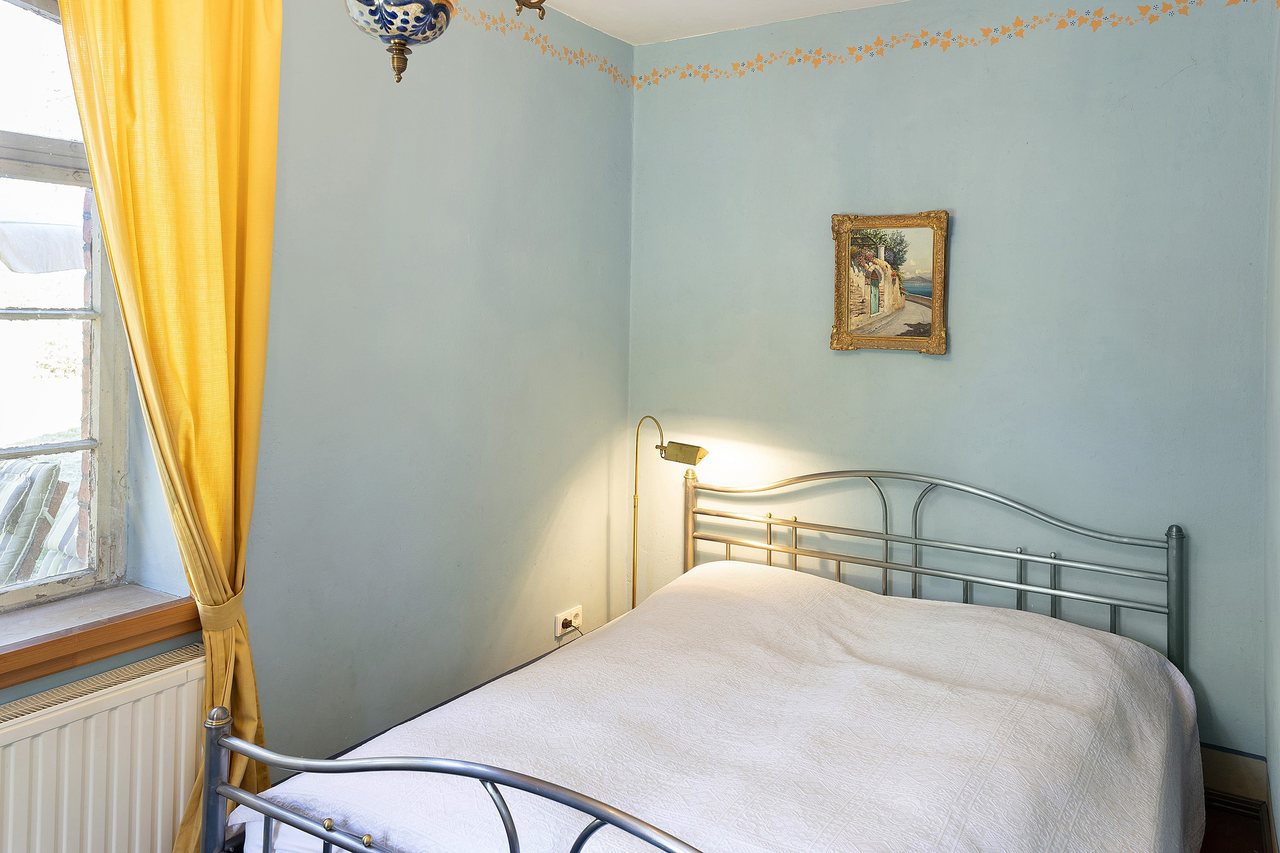 Schlafzimmer mit Doppelbett, Ferienwohnung am Roten Schloss in Baruth/Mark, Brandenburg