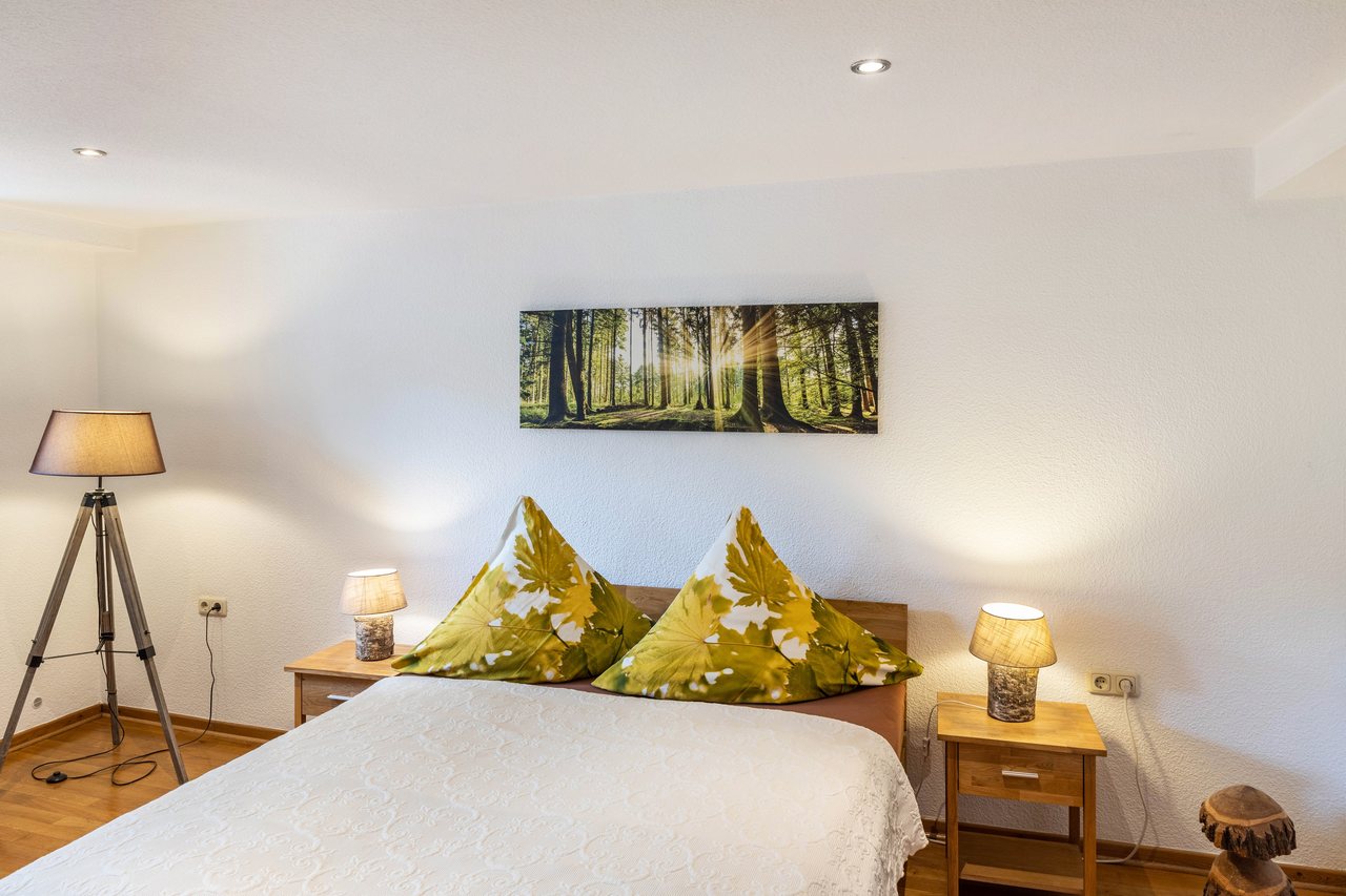 Schlafzimmer mit Doppelbett, Ferienwohnung An der Wublitz in Werder, Brandenburg